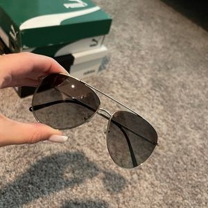 Burberry aviator sunglasses.